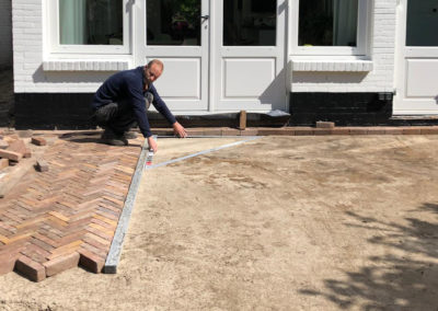 Bestrating laten leggen